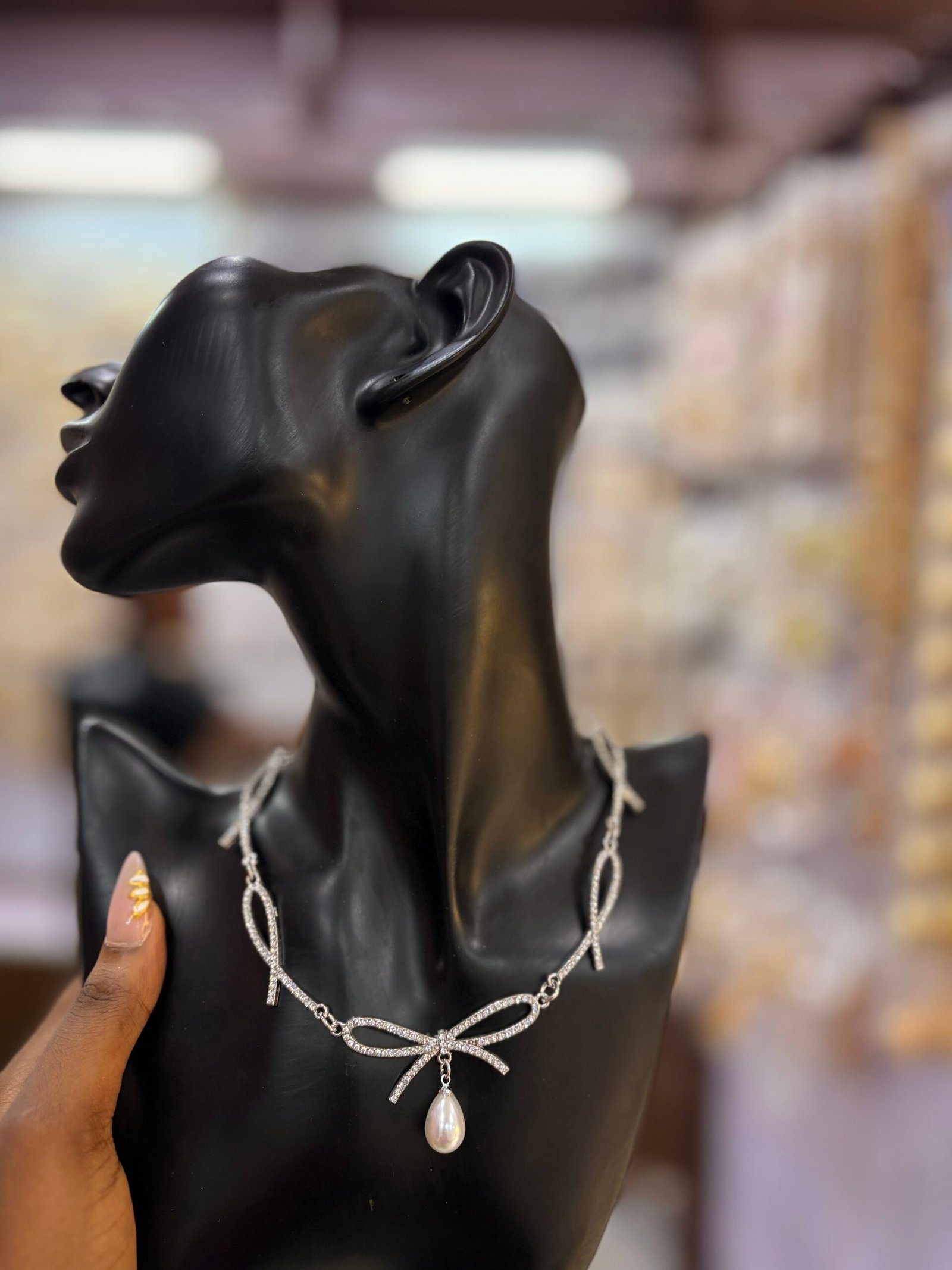 img_0537 BOW PEARL NECKLACE - Image 1
